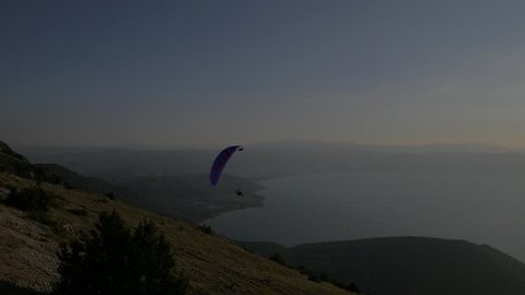 Paraglider at sunset.