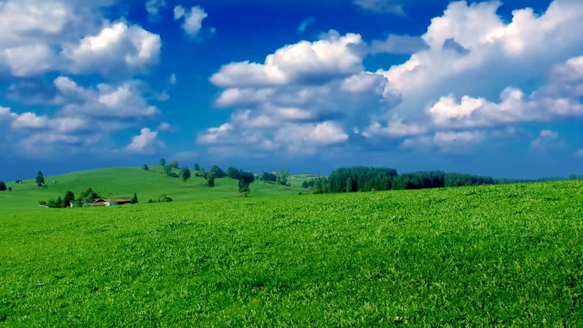 time lapse green field clouds