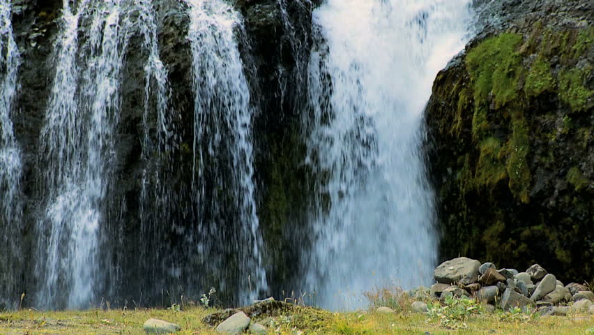 Female Hiker Reaching a Glacial Waterfall | Shutterstock HD Video #1644298