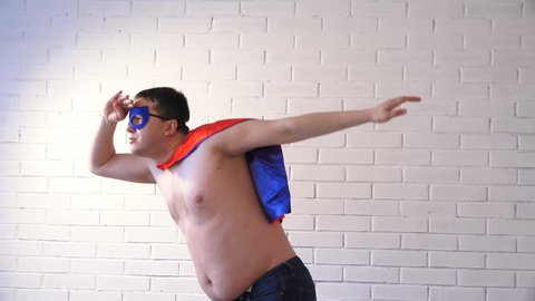 a fat man in a superhero costume