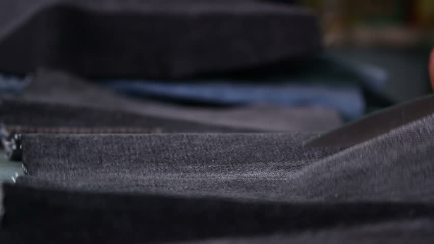 Cutting cloth jeans | Shutterstock HD Video #16448989