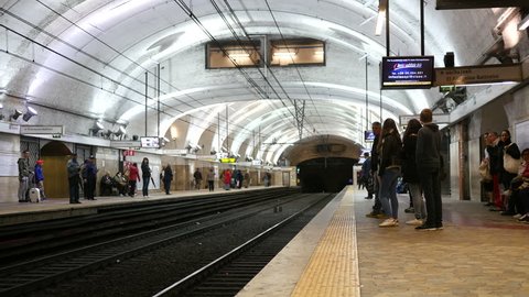ROME, ITALY - APR 26, 2016: People take subway metro train in Rome timelapse