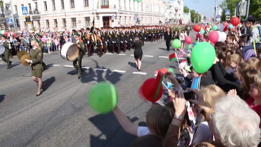 Gomel, Belarus - May 9, 2016: People uniformed Soviet soldiers and officers involved in the parade dedicated to the Victory Day on vehicles of World War II.