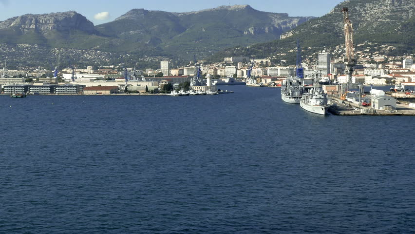 TOULON, FRANCE-CIRCA SEPTEMBER 2014: From a passing cruise ship the major French naval base at the harbor of Toulon. The military port of Toulon is the major naval centre on France
