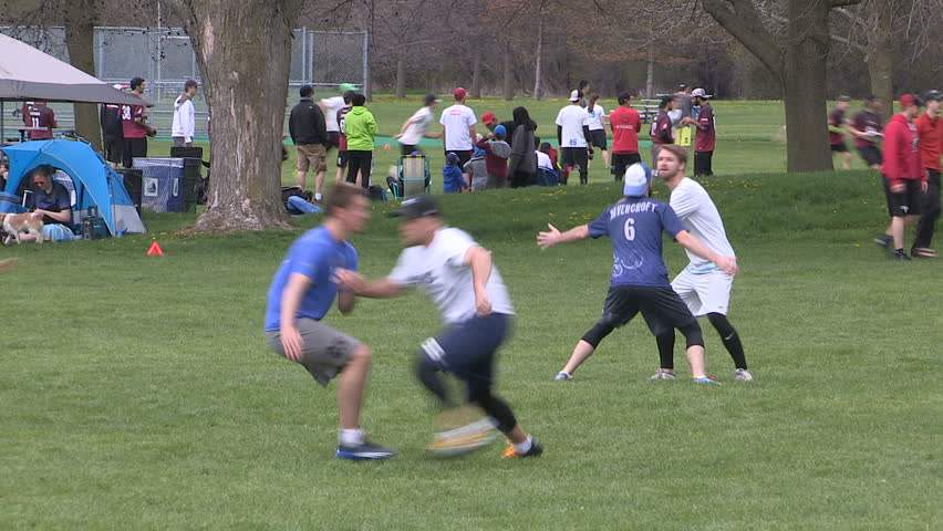 Toronto, Ontario, Canada May 2016 Teams playing competitive ultimate frisbee sport in Toronto | Shutterstock HD Video #16483606