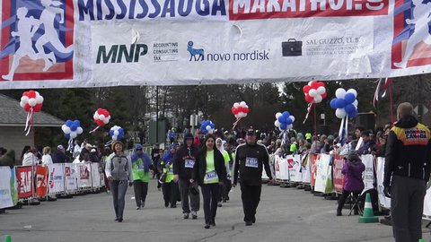 MISSISSAUGA =- APRIL 30:  Runners reach finish line at the Mississauga Marathon 5KM and 10KM race at  Lakefront Promenade Park on April 30, 2016, Ontario, Canada