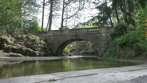 Victorian stone bridge over water