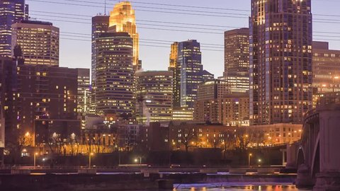 Tight Shot of Minneapolis Skyline and Traffic from St Anthony Main During a Late Spring Sunset HD Timelapse
