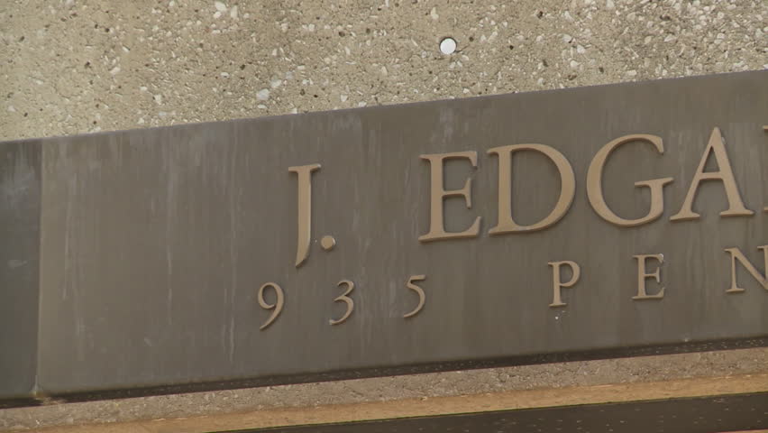 WASHINGTON, D.C., - April 2016: Pan Sign J. Edgar Hoover FBI Building 