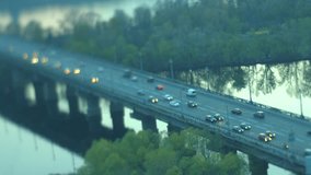 Paton Bridge over Dnieper river. Eastern Europe, Ukraine. Time lapse video footage Ultra Full HD 4K. Tilt and Shift.