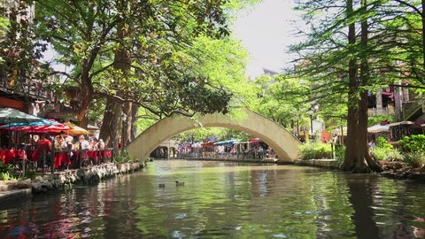 SAN ANTONIO, TEXAS - APRIL 14: View of the historic San Antonio River Walk from a boat on the river in downtown San Antonio, Texas on April 14th, 2016.