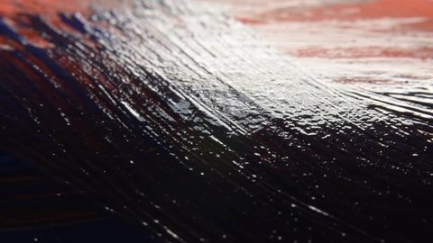 Macro of the brush, painting with red paint /  Art and painting