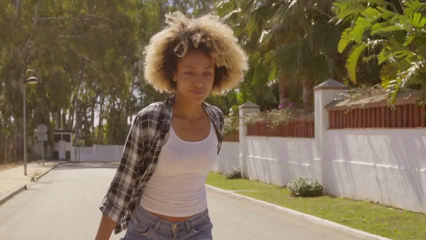 Girl Skates On Roller Skates.