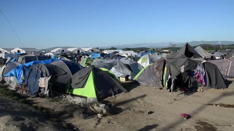 Idomeni refugee camp in Greece.  Border between Greece (EU) and North Macedonia. Tents in migrant camp.  Thousands of refugees and migrants are trapped and stuck at the closed border. Balkan Route.