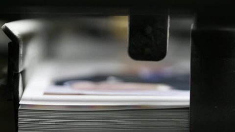 Printing products printed on a printing press in the close-up.
