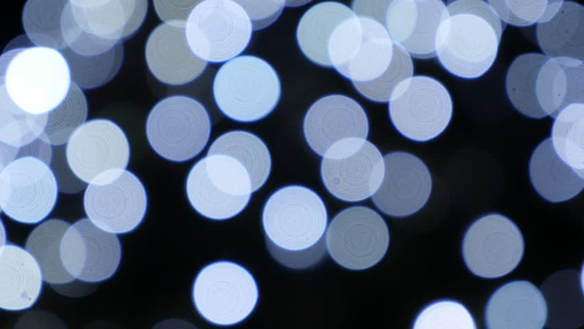 Slow Motion Background Of White Christmas Lights Defocused Slow Motion Background Of White