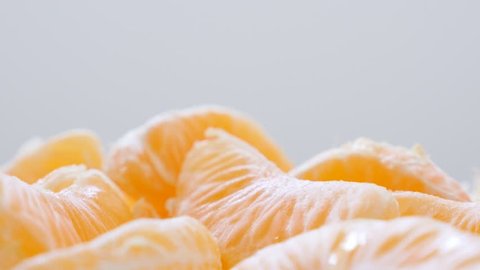 Fruit Citrus tangerina orange family pile food background 4K 3840X2160 30fps  UltraHD tilting footage - Slow tilt on mandarin orange juicy and fresh fruit 4K 2160p UHD vide Vídeo Stock