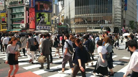 Tokyo- May 2016: People at Shibuya crossing. 4K resolution Video stock
