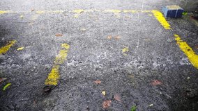 Raindrop falling on the ground.