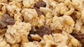 Tasty muesli crunch in the bowl high quality balanced meal 4K 2160p 30fps UHD tilting footage - Cereals and dried fruit food background slow tilt 4K 3840X2160 UltraHD video