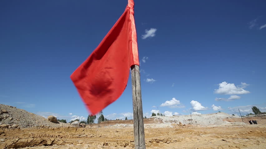 The red flag in the open mine