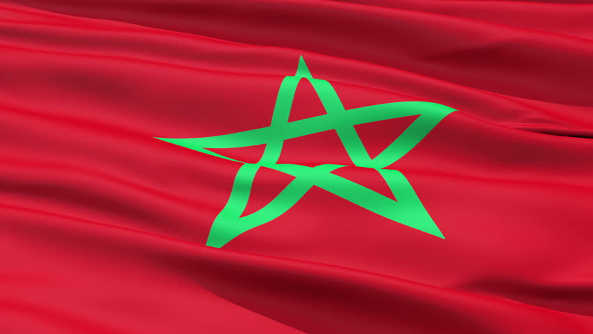 The red waving Flag Of Morocco with a centred black-bordered green pentagram