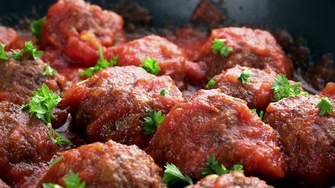 Fresh made Meatballs with tomato sauce (not loopable; 4K)