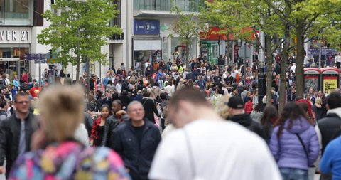 LIVERPOOL, ENGLAND - MAY 26, 2015 Liverpool UK City Center Shopping Street People Walk Commuters Commute Rush Hour ( Ultra High Definition, UltraHD, Ultra HD, UHD, 4K, 2160P, 4096x2160 )