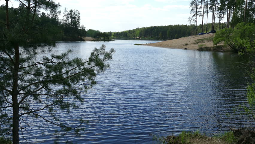 Lake of the Woods in the Spring .orehovo Zuyevo. Water. Sun Reflection. Trees. Spring Mood