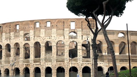 Pan shot of Flavian amphitheatre Colloseum in Rome
