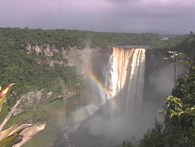 Beautiful Keituer waterfalls in Guyana and rainbow