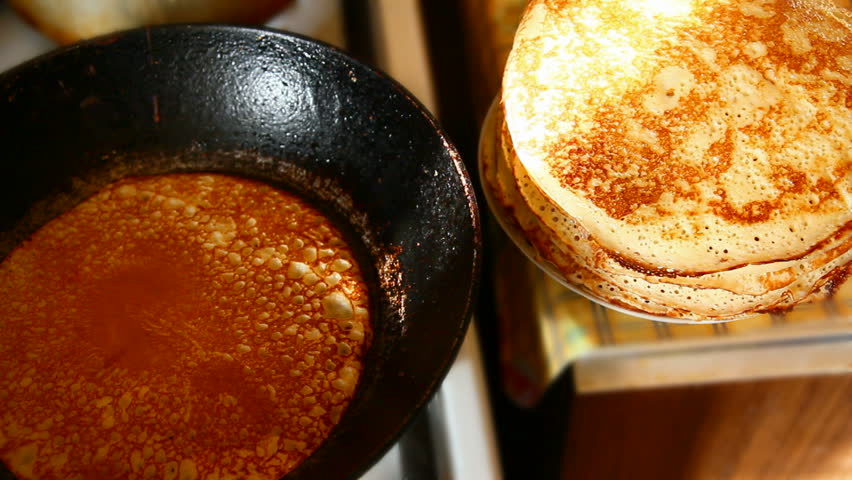 baking pancakes in a frying pan