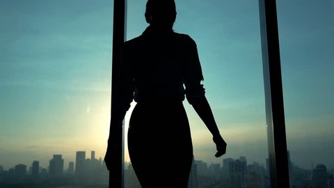 Young woman admire cityscape during sunset, slow motion
