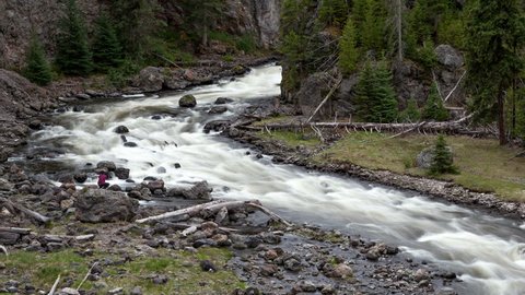 4K Time lapse zoom out rough stream of the Little Firehole River in Yellowstone National Park close to Firehole Falls
