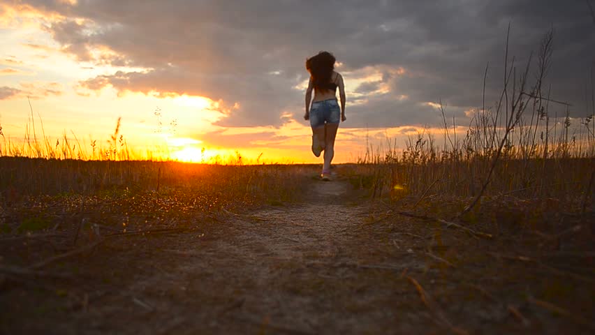 Beautiful girl running jogging working out at sunset | Shutterstock HD Video #16682788