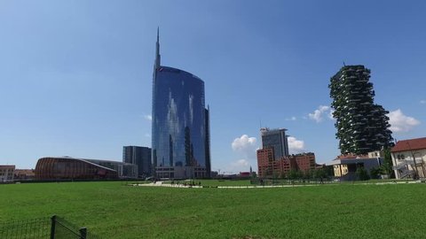 Milan, Italy - May 16, 2016: Unicredit Tower and skyscrapers of Porta Garibaldi, Vertical Forest and tower Solaria (Ultra High Definition, UltraHD, Ultra HD, UHD, 4K, 2160P, 3840x2160)