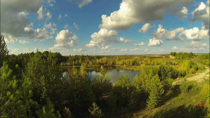 Flight over the lake in autumn