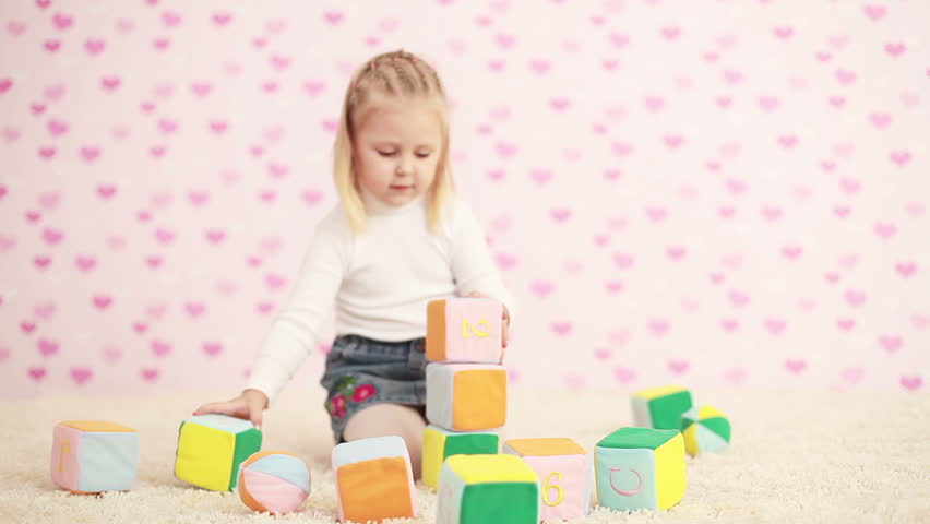 Girl playing in the childrens room 