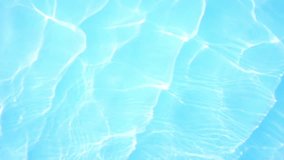 Blue swimming pool rippled water background, great for your background and texture