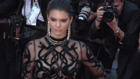 Cannes - May 15: Kendall Jenner in black and sheer patterned Roberto Cavalli gown, close up of her at the Cannes Film Festival 2016