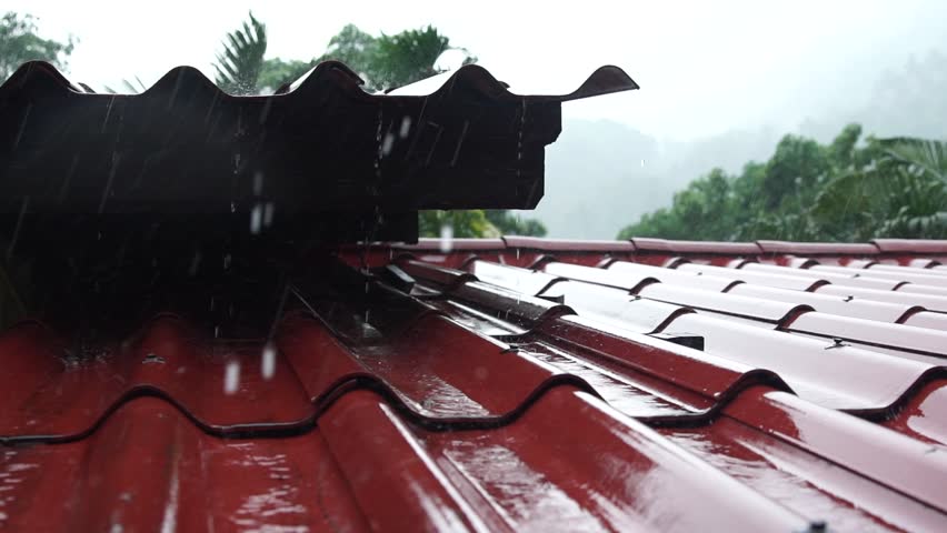 The roof of the house under a strong rain shower in the mountains. Slow motion - Powered by Shutterstock - Get 15% off with code: PIKWIZARD15