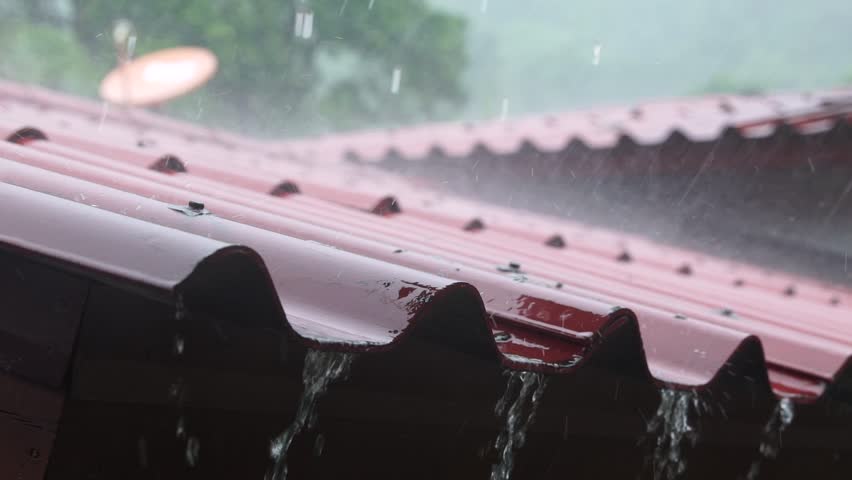 The roof of the house under a strong rain shower in the mountains. Slow motion - Powered by Shutterstock - Get 15% off with code: PIKWIZARD15