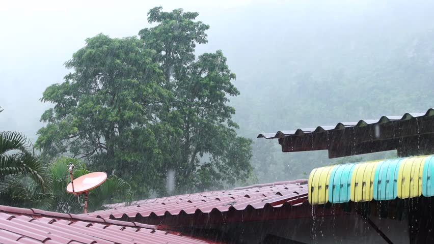 The roof of the house under a strong rain shower in the mountains. Slow motion - Powered by Shutterstock - Get 15% off with code: PIKWIZARD15