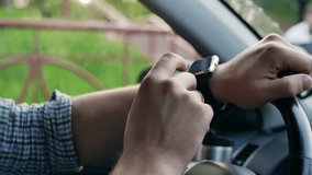 Man hands using smartwatch touchscreen 
