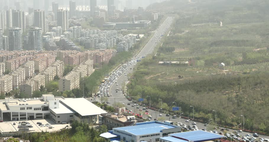 4k china urban city busy traffic jams,highway street & business houses building,air pollution. gh2_11335_4k