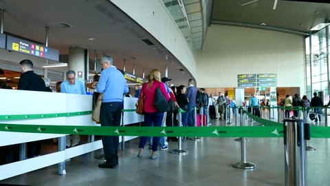 VALENCIA, SPAIN - MAY 18, 2016: Timelapse of airline passengers checking in at the security line at the Valencia Airport. About 4.98 million passengers passed through the airport in 2015.
