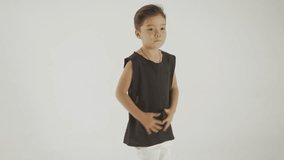 Little Stylish Boy In Black T-Shirt Dancing And Having Fun, Isolated On White