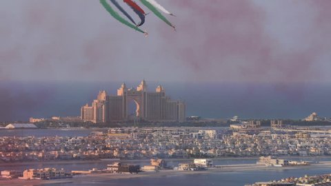 Palm Island  with planes drawing national flag with smoke