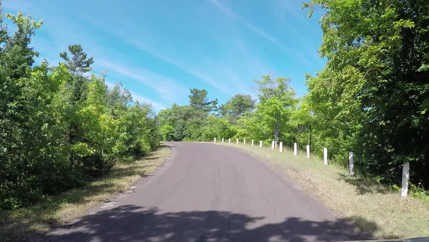 Driving down a rural road in the upper peninsula of Michigan