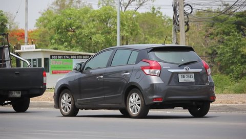 CHIANGMAI, THAILAND - MAY 19 2016:    Private Eco car, Toyota Yaris.  Clip at road no 1001 about 8 km from downtown Chiangmai, thailand.